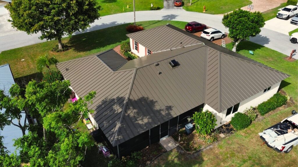 Clean standing seam metal roof installation on commercial building